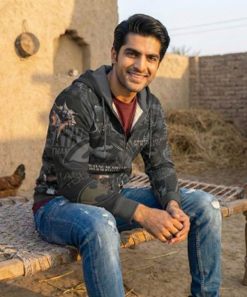 batman gotham knight sublimated all over print hoodie pakistan male model sitting view