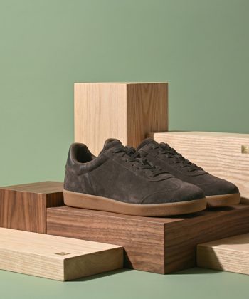 Side profile view of the Umber Classic suede sneakers showing the low-top silhouette and contrasting gum sole.