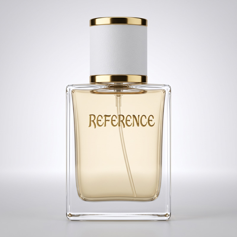 Front view of the Reference perfume bottle against a pure white studio background, displaying the golden fragrance liquid, white textured cap, and gold branding.